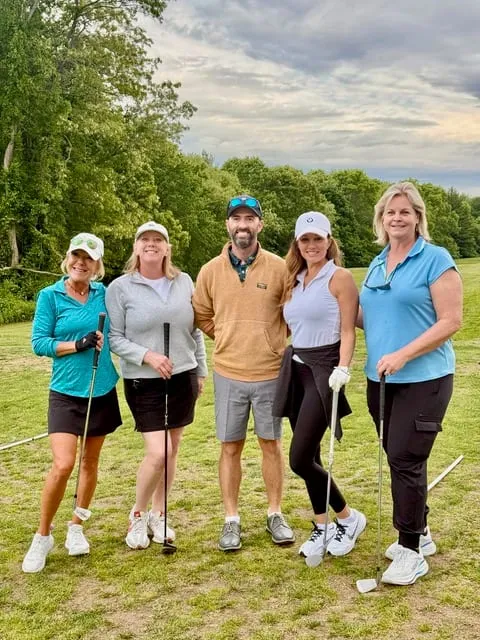 Christian Grace teaching a small group of women at the range